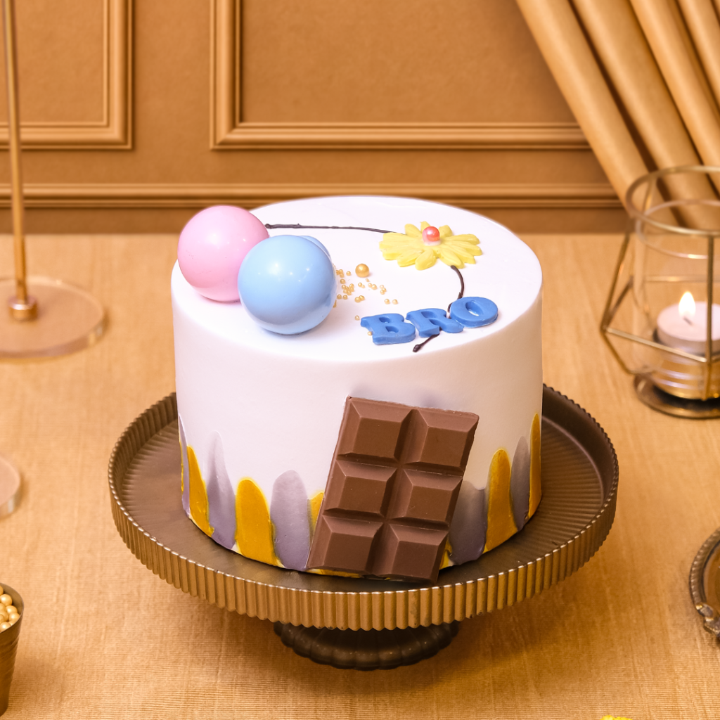 My Bro Cake Tall n Fancy, a tall chocolate cake for brother Rakhi with gold pearls and 3D BRO design