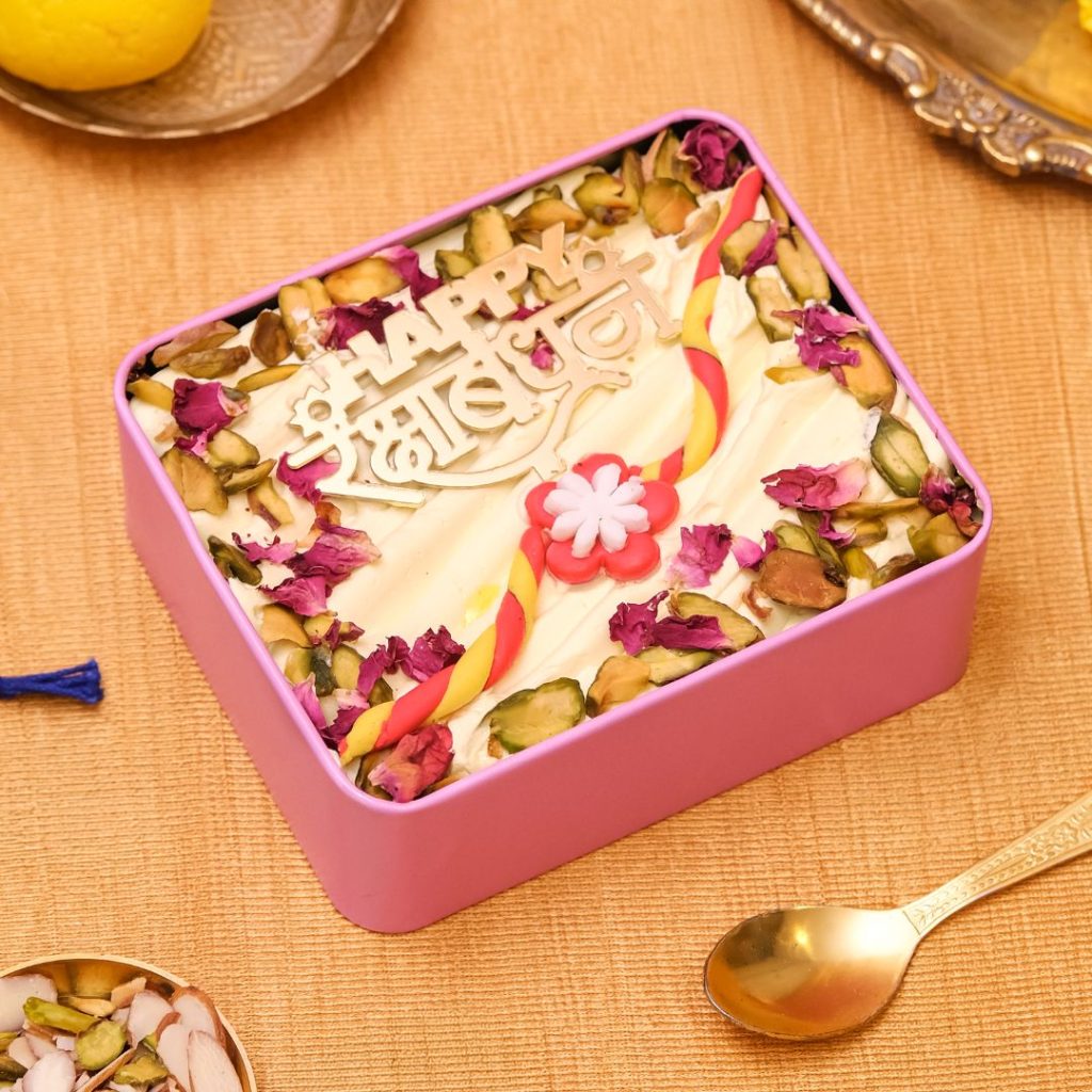 Sibling Love Raksha Bandhan Cake, a Rajbhog cake for Rakhi with pistachios and rose petals